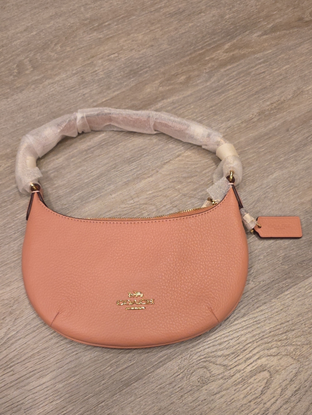NWT Coach Pebbled Leather Mini Payton Crossbody In Pink Petal Color.